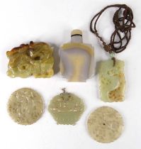 Assorted Chinese russet jade pendant carvings; together with a hardstone scent bottle (6) Scent