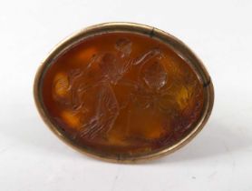 A gilt metal and carnelian(?) set fob seal pendant, 3cm