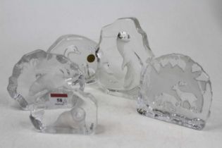 A collection of five Royal Krona and Cristal d'Arques glass paperweights, largest height 17cm