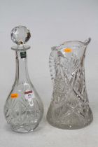 A Thomas Webb crystal decanter, height 33cm, together with a prism cut crystal water jug, height