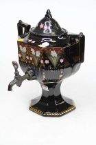 A Victorian black glazed pottery twin handled samovar, height 36cm