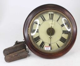 A Victorian postman's alarm clock, having a painted circular Roman dial with brass alarm disc,