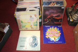 Two boxes of LPs to include Genesis, Elton John, Buddy Holly, and compilation