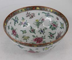 A Chinese Canton porcelain bowl, enamel decorated with flowers, dia.25.5cm