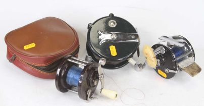 A Penn No. 79 fishing reel together with two other examples to include Paramount and Penn Longbeach