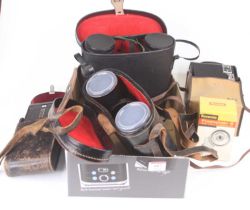 A pair of Miranda 10x50 binoculars, cased, together with another pair, and two vintage cameras