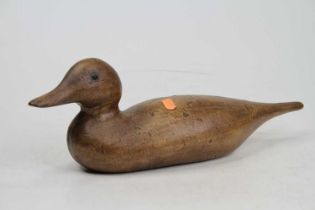 A wood grained metal decoy duck, length 41cm