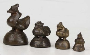 A set of four eastern bronze graduated weights, each in the form of a bird, largest 7cm high