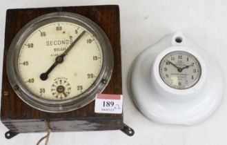 A Ministry of Defence issue Smith lever timing clock, w.14cm; together with The Service Recorder