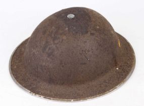 A WWII British military helmet, having typical leather liner and canvas chin strap, dia.28cm