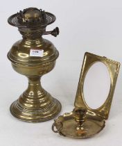 An early 20th century brass oil lamp (lacking shade), height 28cm, together with a brass chamber