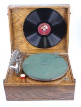 A First World War oak cased trench gramophone, with carry handle, w.34.5cm Works as it should.Case