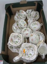 A Victorian Rockingham tea service, enamel decorated with flowers Teapot is broken, as is the