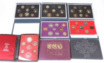 A collection of cased proof sets to include Gt Britain 1990 issued by the Royal Mint coinage of Gt