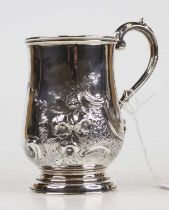 An early Victorian silver and embossed bell shaped christening mug, 4.3oz, London 1853, h.11cm