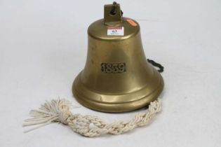 A brass ship's bell, dated 1839, height 19cm