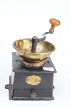 A vintage cast iron coffee grinder, height 21cm