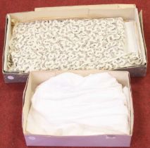 A cotton lace christening gown, and various others, lace table linens etc