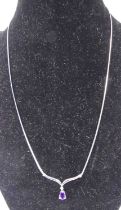 A contemporary 9ct white gold and amethyst set necklace, 3.5g, in fitted case for H Samuel jewellers