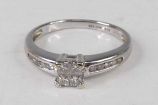 A contemporary 18ct white gold diamond dress ring, arranged as four Princess cuts in a square