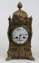 A late Victorian brass cased mantel clock by Hill of Old Street, London, the case of architectural