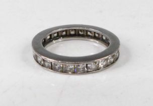 A white metal and cz set eternity ring, unmarked but tests as silver, 3.5g, size L