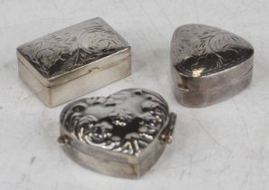 A modern silver and embossed heart shaped pill box, 3cm; together with two other examples, 0.8oz