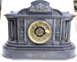 A Victorian slate mantel clock, of architectural form, having a gilt chapter ring, and eight day