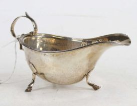 A George V hammered silver sauceboat, 3.5oz, maker S. Blanckensee & Son Ltd, w.16cm