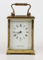 A Shortbland Bowen lacquered brass minuet carriage clock, having visible platform escapement, signed