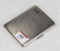 A George V silver engine turned pocket cigarette case, with engraved monogram, 5.4oz, 10.5cm