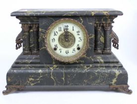 A late 19th century American faux marble cased mantel clock, having unsigned Arabic dial and eight-