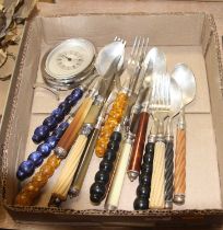 A collection of mixed flatware, each having ornate beaded handles; together with a JW Benson strut
