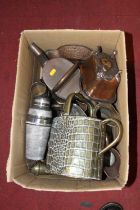 A collection of metal wares to include a Victorian copper watering can, and an early 20th century