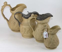 A collection of four Victorian relief moulded jugs, to include Ridgeway, largest h.27cm