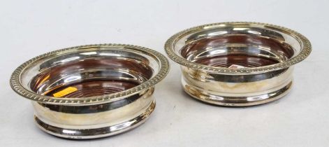 A pair of Victorian style silver plated wine coasters, dia.14.5cm