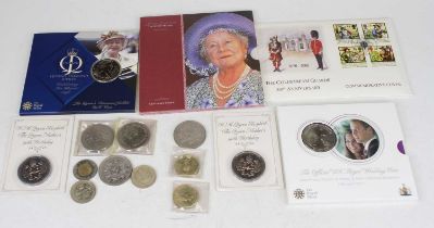 A collection of commemorative crowns and first day covers