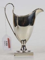 A George III silver helmet form cream jug, 3.5oz, maker Peter & Ann Bateman, London 1793, h.14cm