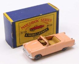 Matchbox Lesney No. 39 Ford Zodiac Convertible, peach body, with a tan interior, metal wheels, and