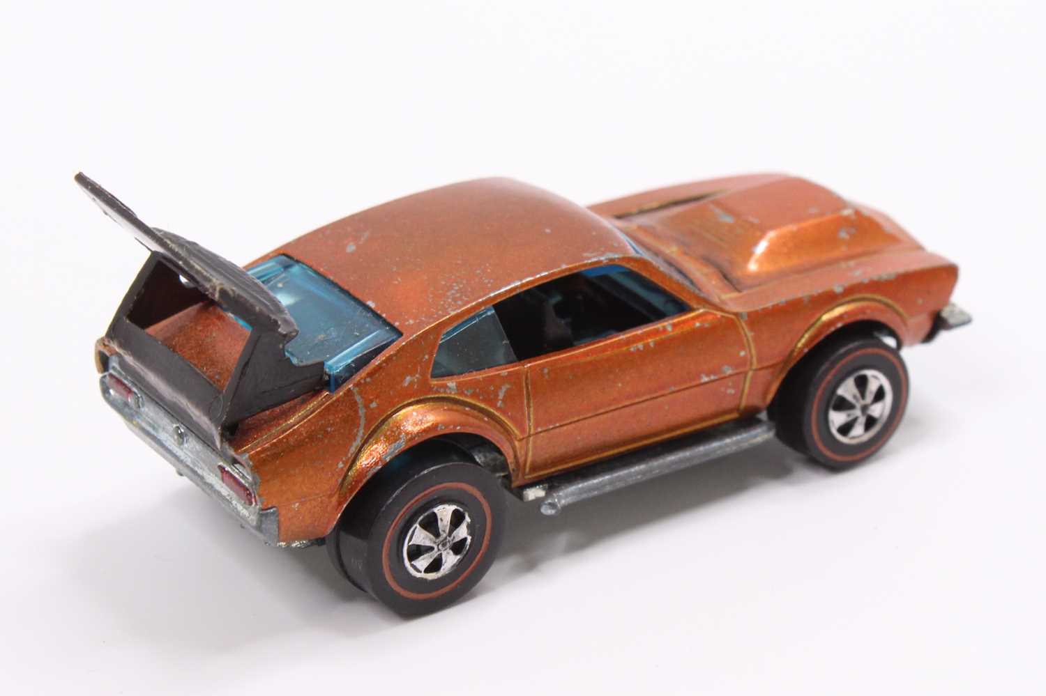 A Hot Wheels Redlines 'Mighty Maverick' in copper with a black interior & spoiler (VG) - Image 2 of 5