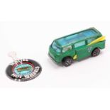 A Hot Wheels Redlines Beach Bomb Volkswagen Camper Van in emerald, with a white interior, comes with