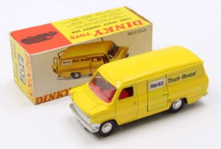 A Dinky Toys No. 407 Ford Hertz transit van, comprising of yellow body with red interior and flat
