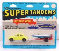 A Charmerz of New York, Super Tandems diecast set comprising of Playart VW Beetle with boat