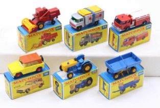 A collection of six boxed Matchbox E type boxed diecast vehicles to include No. 39 Ford tractor, No.