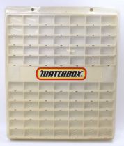A 1970's Matchbox Lesney Superfast retailers shop display, with 77 model compartments, all in