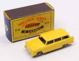 Matchbox Lesney No. 31 Ford American Station Wagon, yellow body, with silver trim, and grey