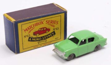 Matchbox Lesney No. 43 Hillman Minx, green body, with silver trim, and metal wheels, the model has