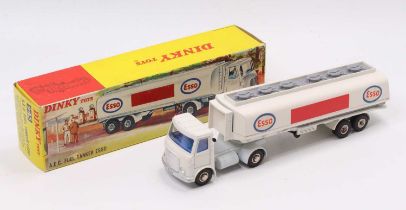 A Dinky Toys No. 945 AEC fuel tanker Esso comprising all-white body with chromed domed hubs,