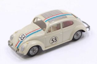 A Tekno 1/43rd scale Volkswagen 'Herbie' Beetle comprising of a white body, with a red interior,