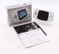 A Nintendo Game Boy Advance white edition, housed in the original card box, with instruction